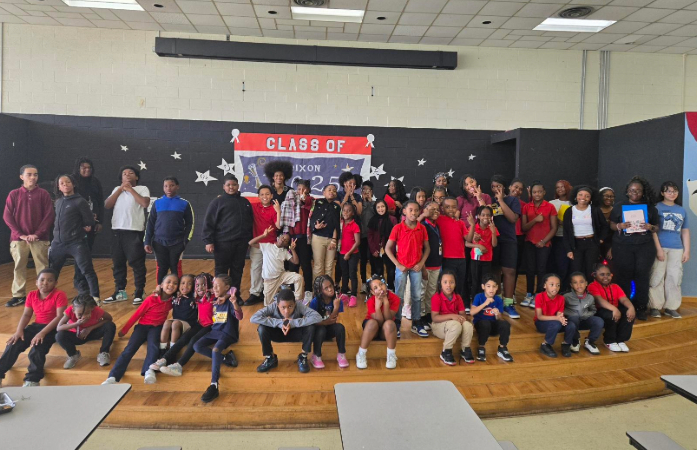  students on stage at the appreciation breakfast